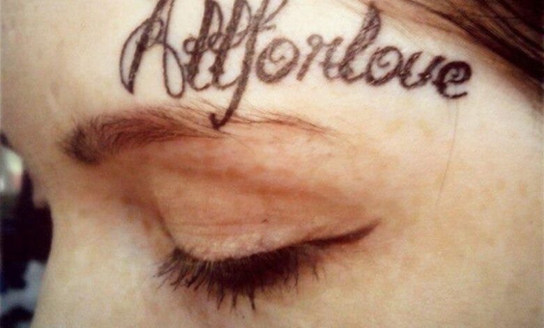 above eyebrow tattoo