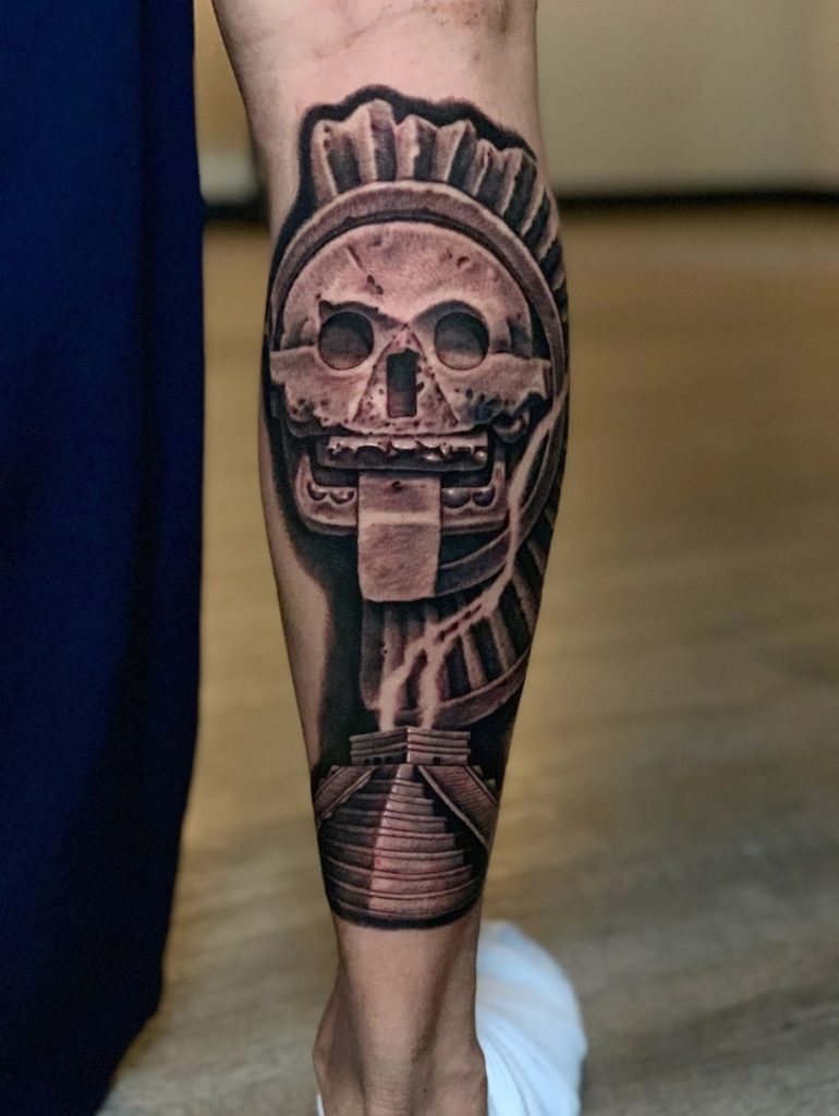 aztec god of death tattoo