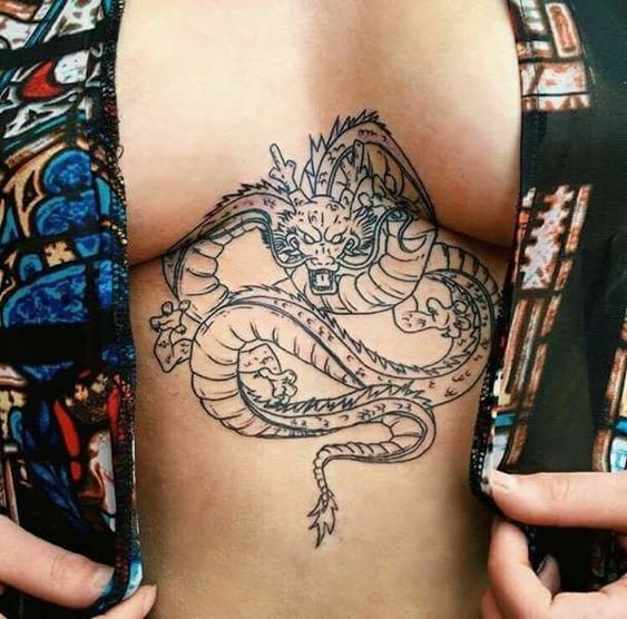 dragon sternum tattoo