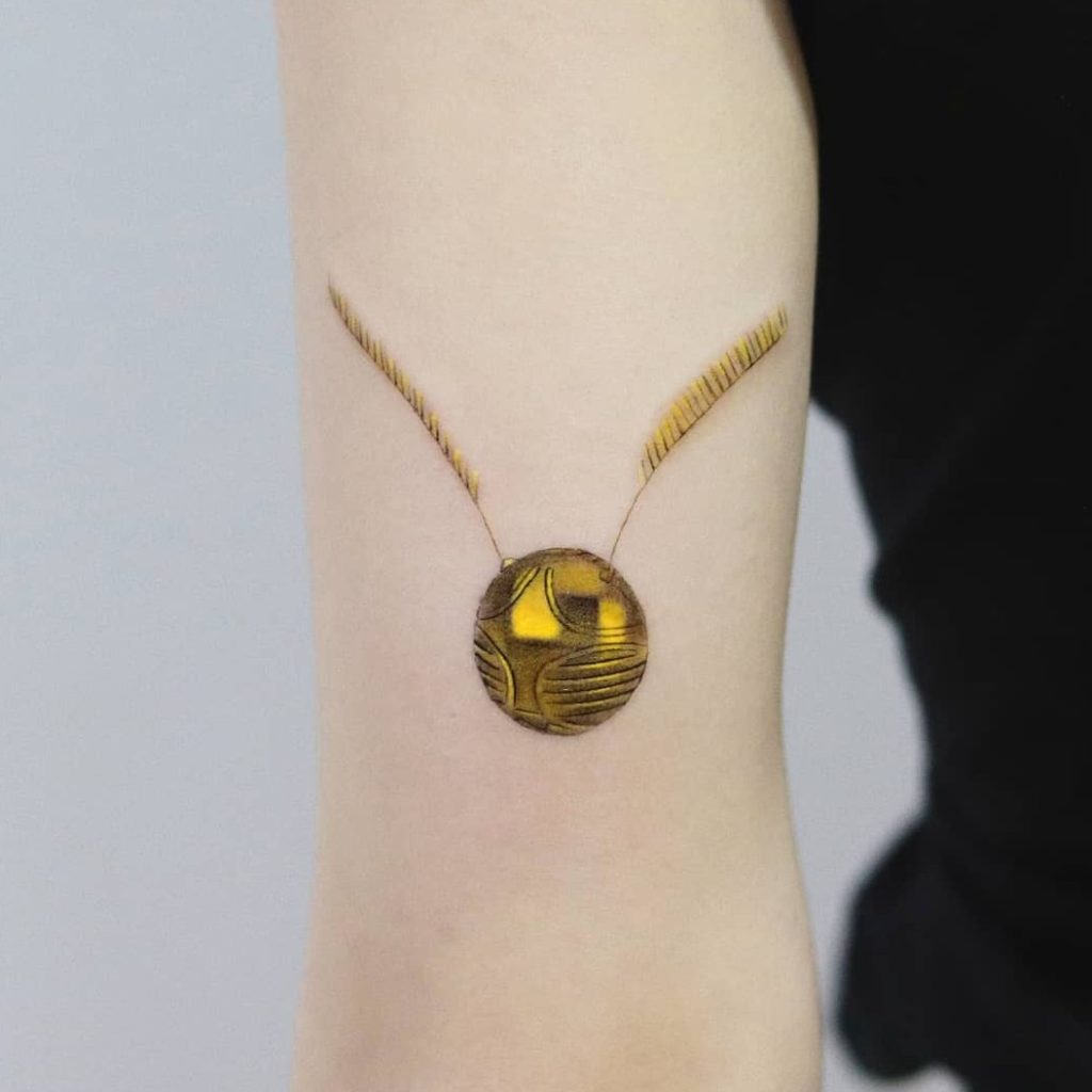 golden snitch tattoo