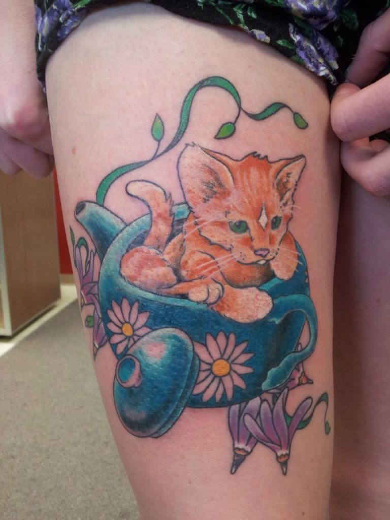 Lone kitten tattoo