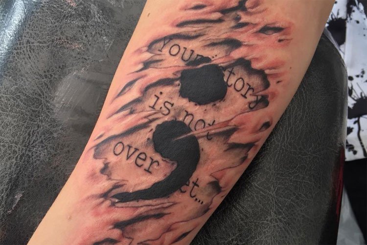 my story isn t over yet tattoo