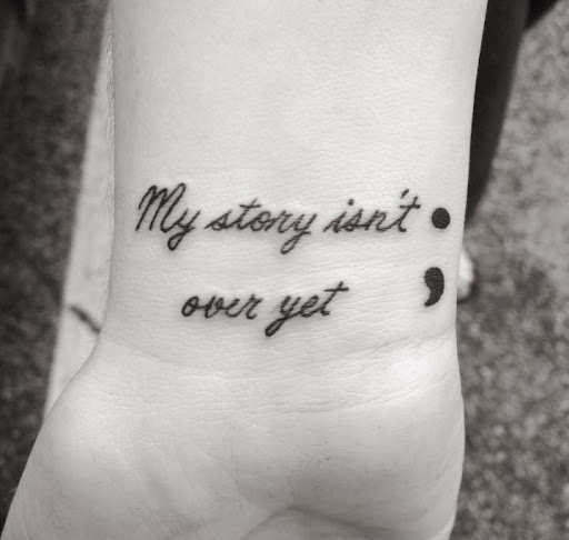 my story isn t over yet tattoo