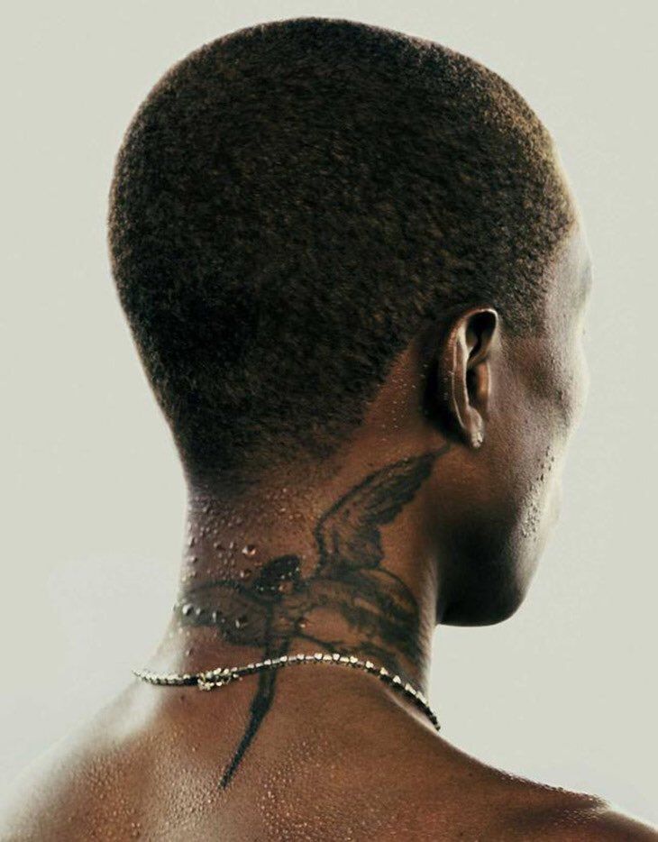 pharrell neck tattoo