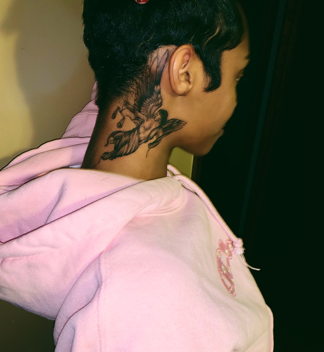 pharrell neck tattoo.