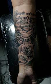 Romans 8 18 tattoo	
