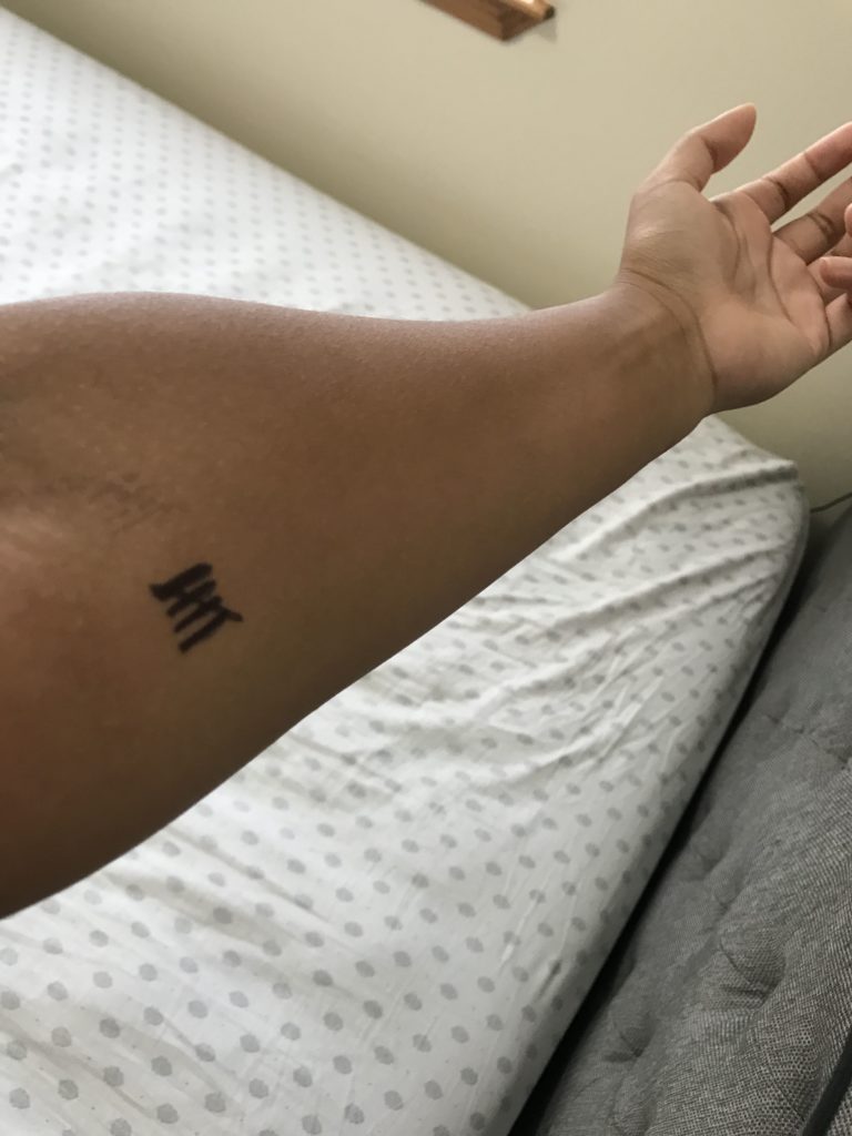 Tally mark tattoo