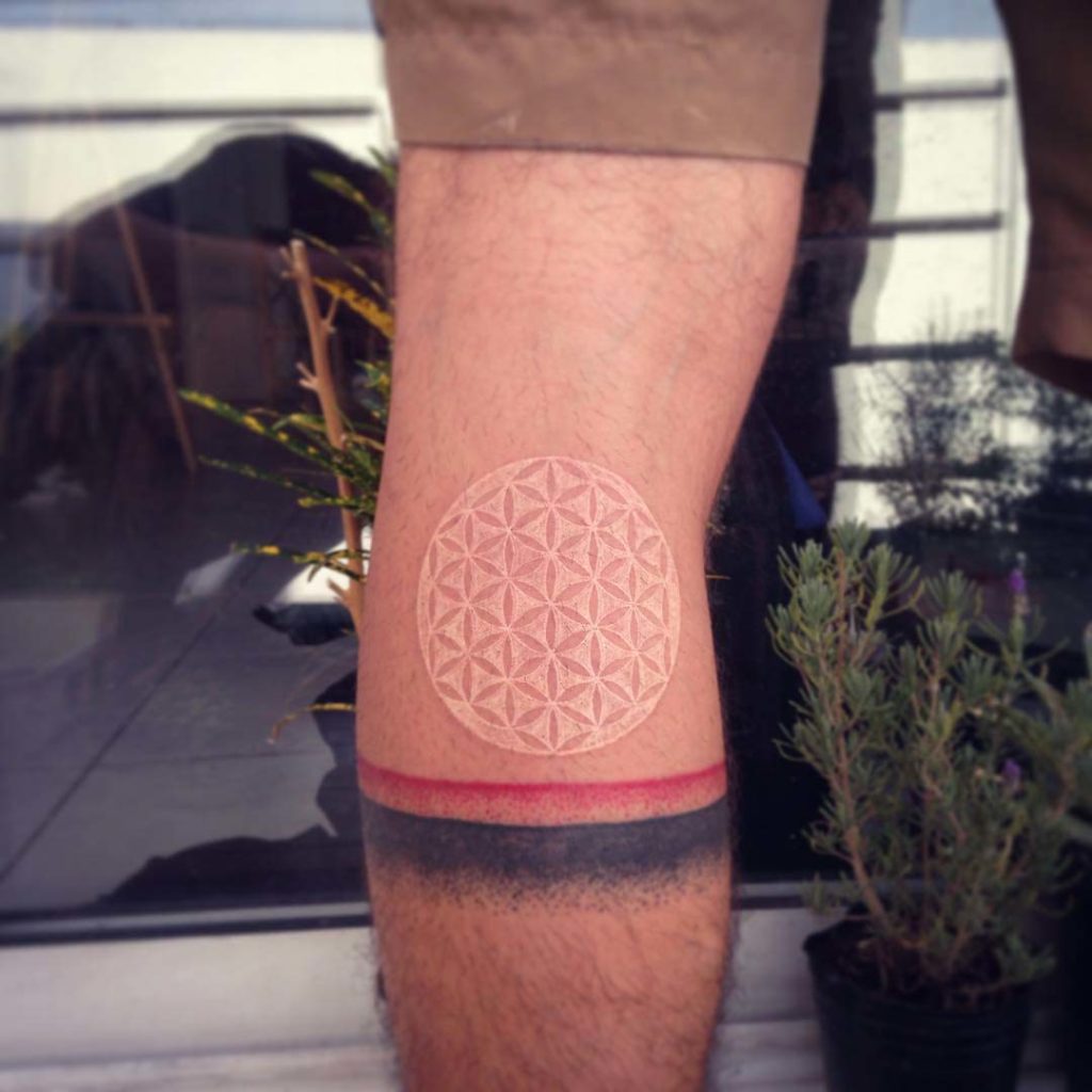 back of knee tattoo