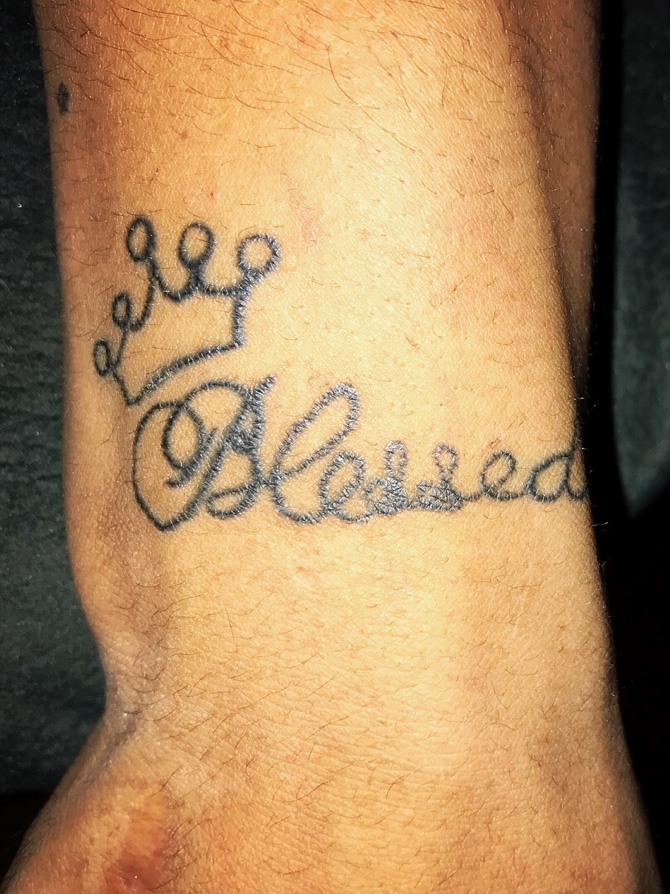 blessed tattoo on wrist