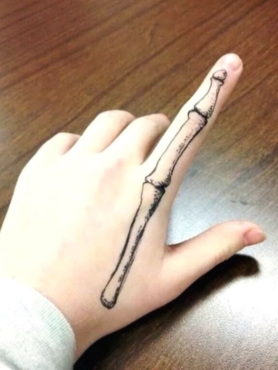 bone finger tattoo