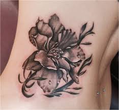 july flower tattoo