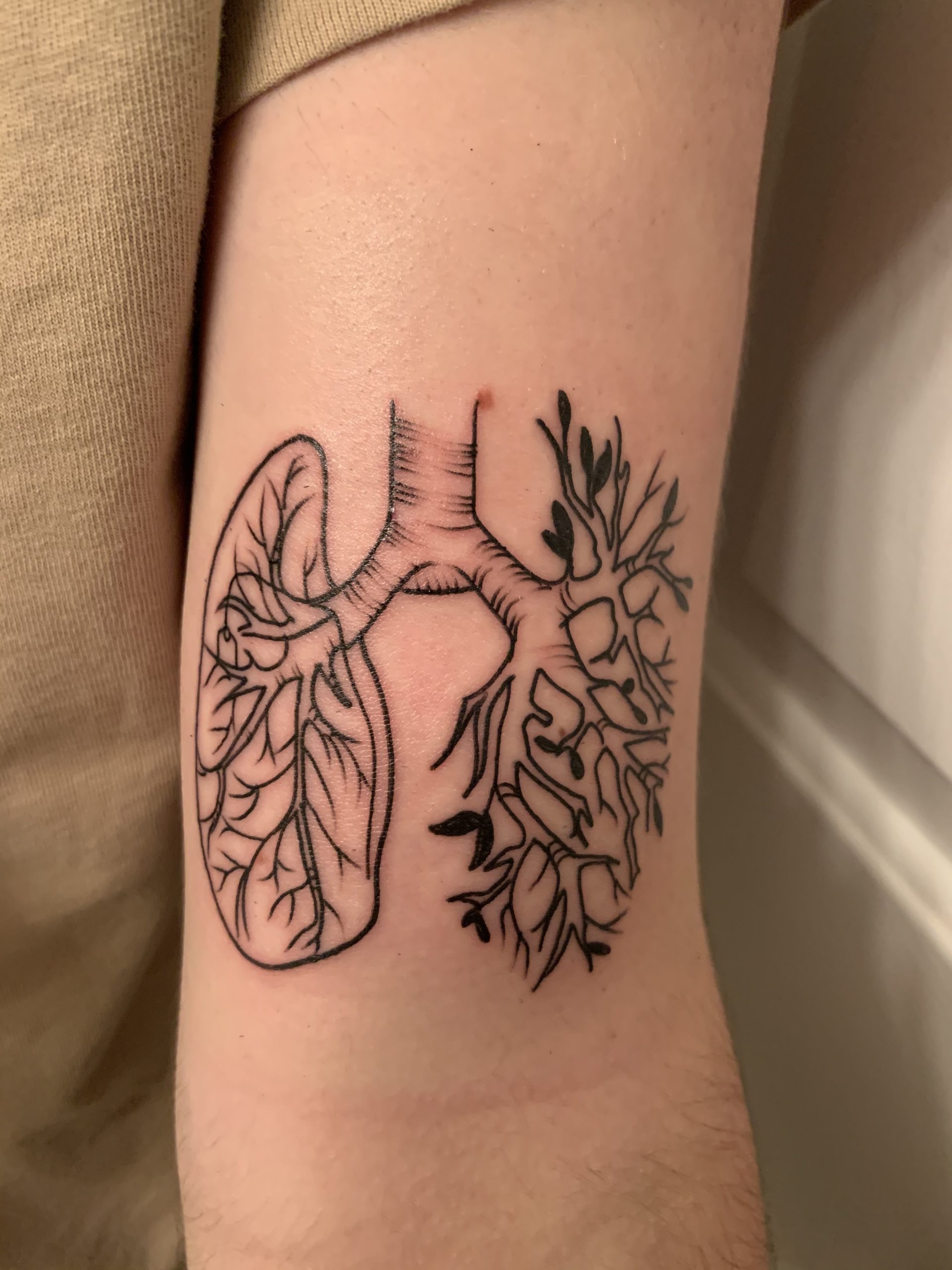 Aesthetically Pleasing And Appealling Lung Tattoo