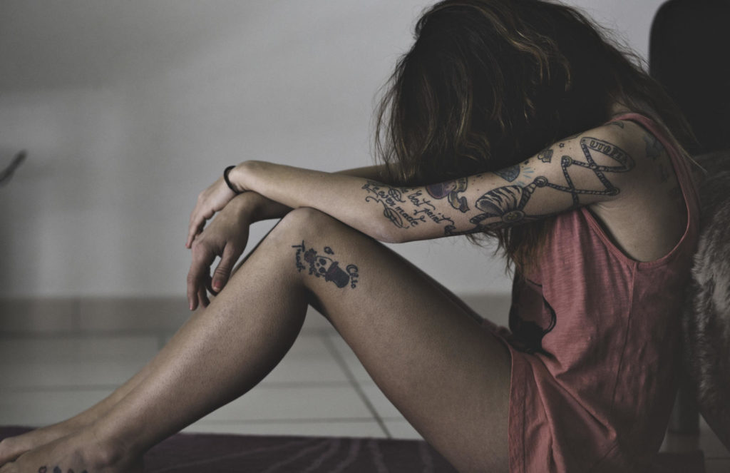 sad girl tattoo