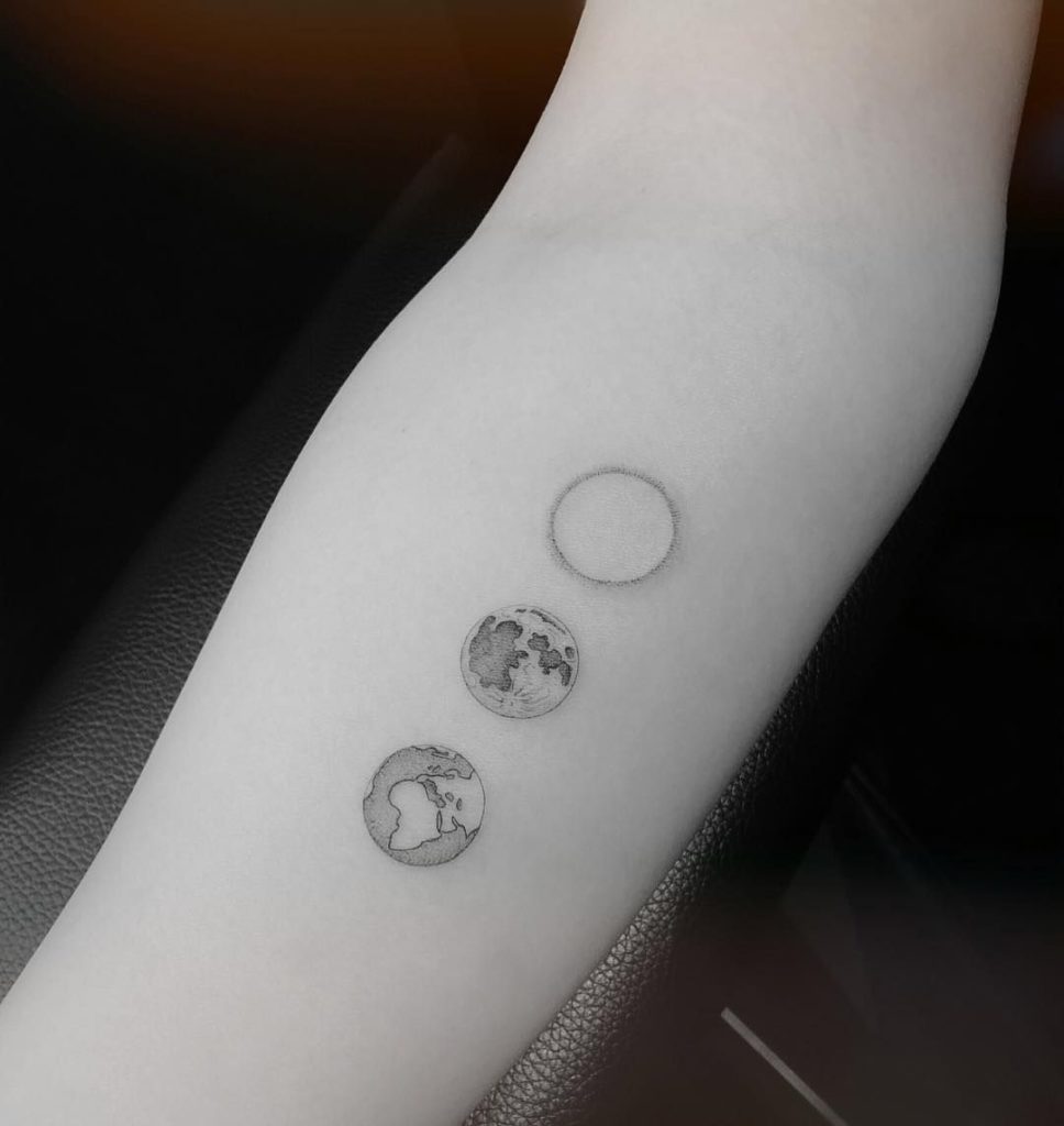 solar eclipse tattoo