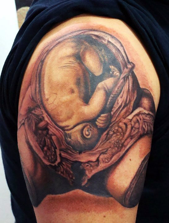 uterus tattoo