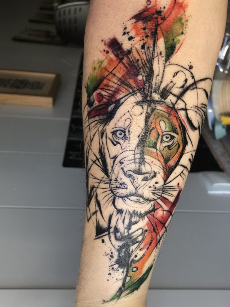 watercolor lion tattoo