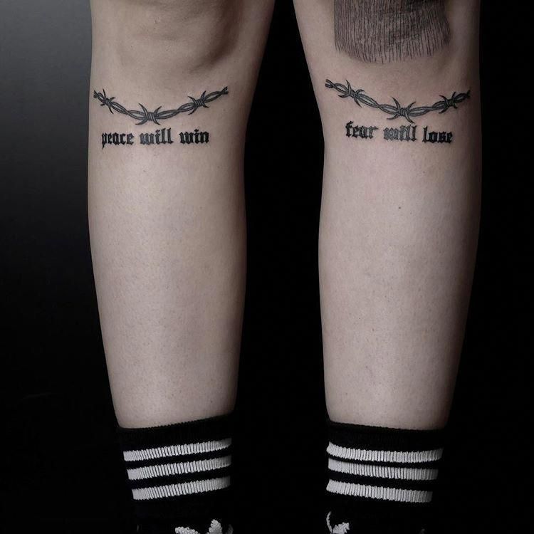 above knee script tattoo