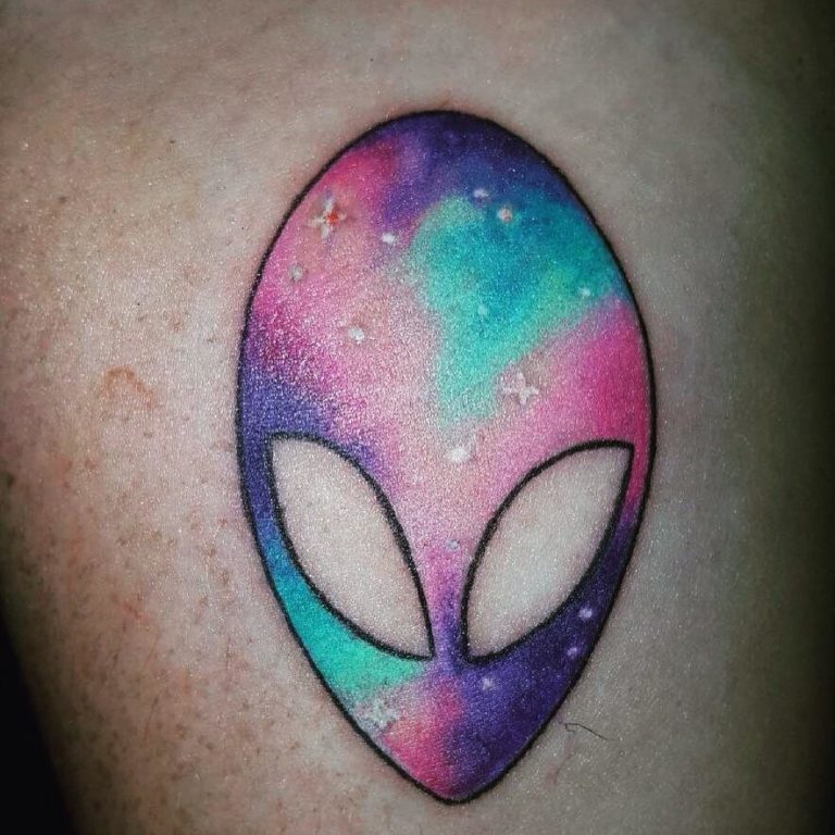 alien head tattoo that will bring out the spook