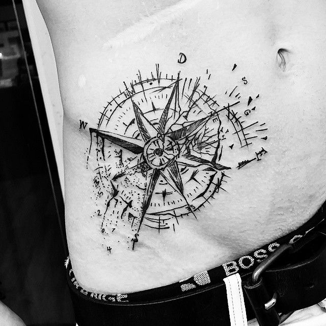 broken compass tattoo