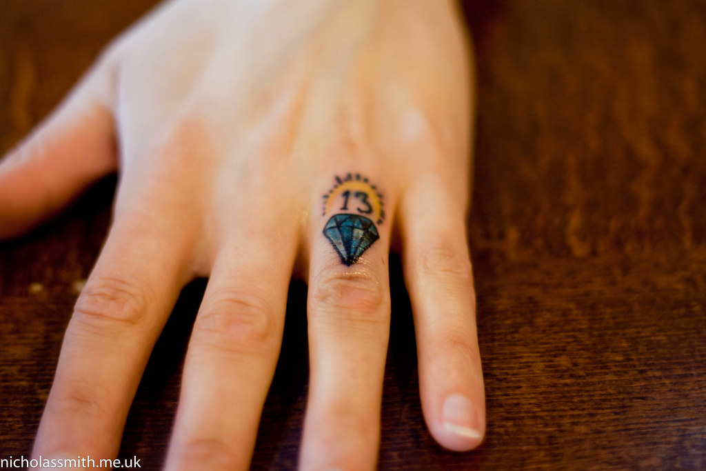 diamond finger tattoo