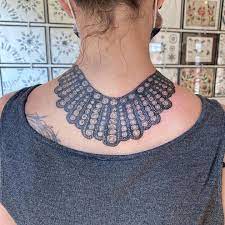 Dissent collar tattoo