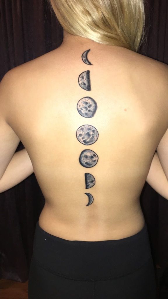 moon phases tattoo spine