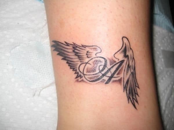 name with angel wings tattoo