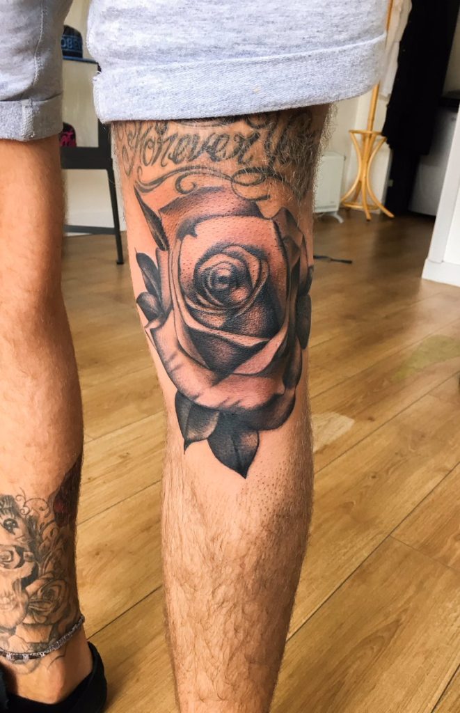rose knee tattoo