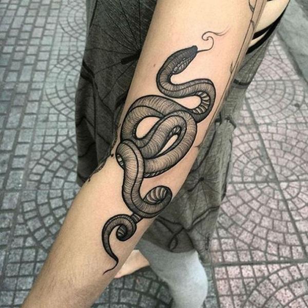 snake bite tattoo