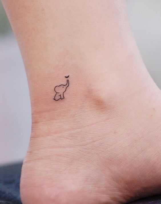 Tiny elephant tattoo