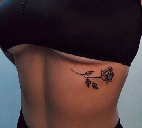 butterfly tattoo under breast