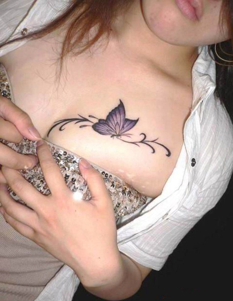 Butterfly tattoo under breast