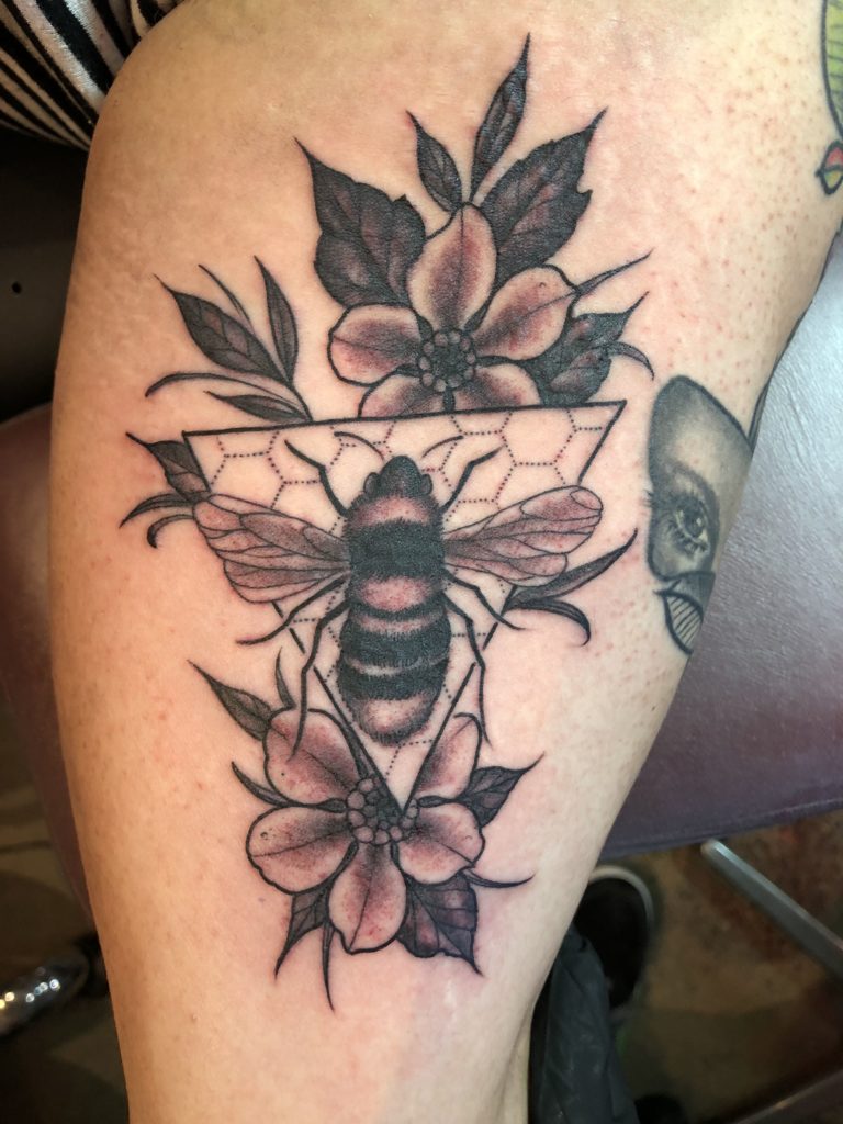 Bee and flower tattoo