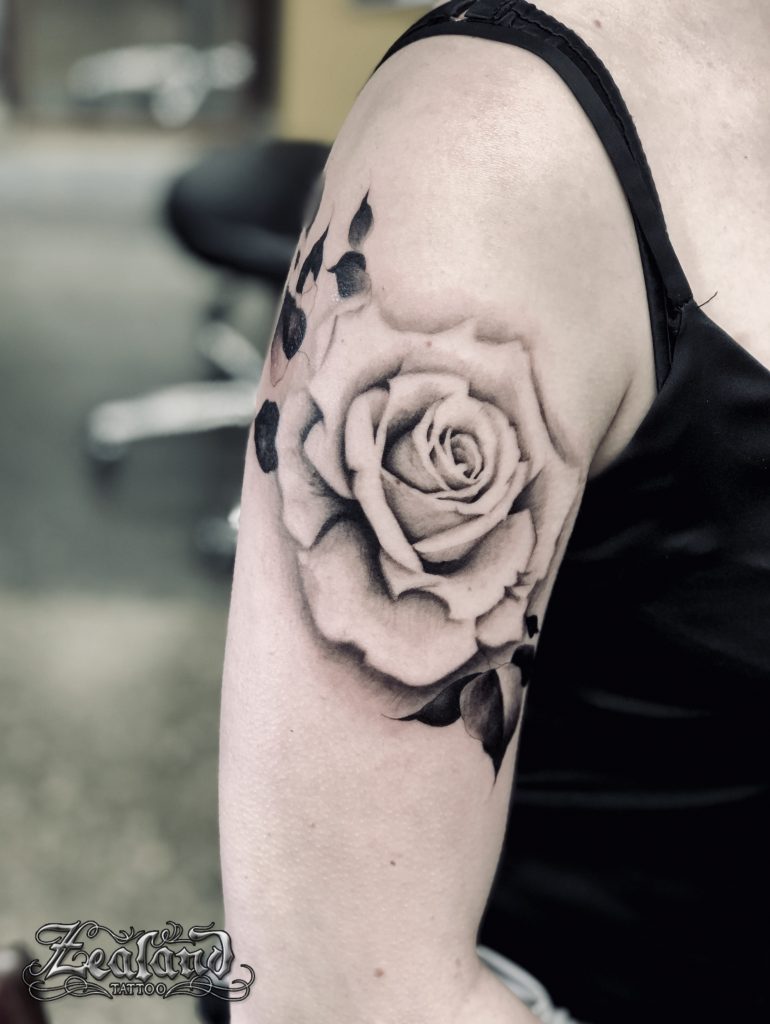 black and grey rose tattoo