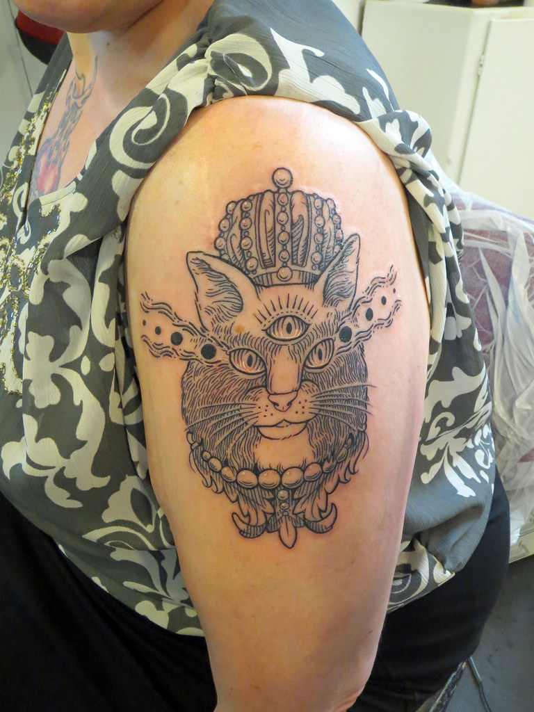 geometric cat tattoo