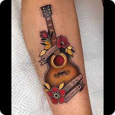 Guitar pick tattoo