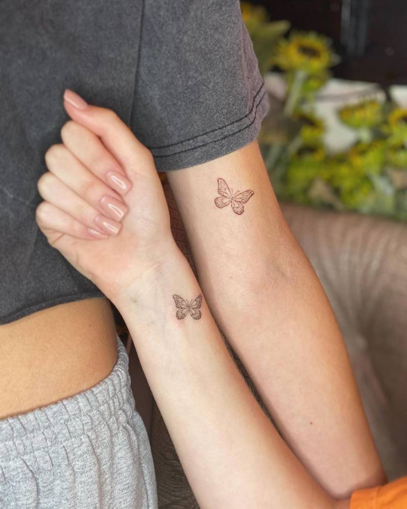 Butterfly sister tattoos