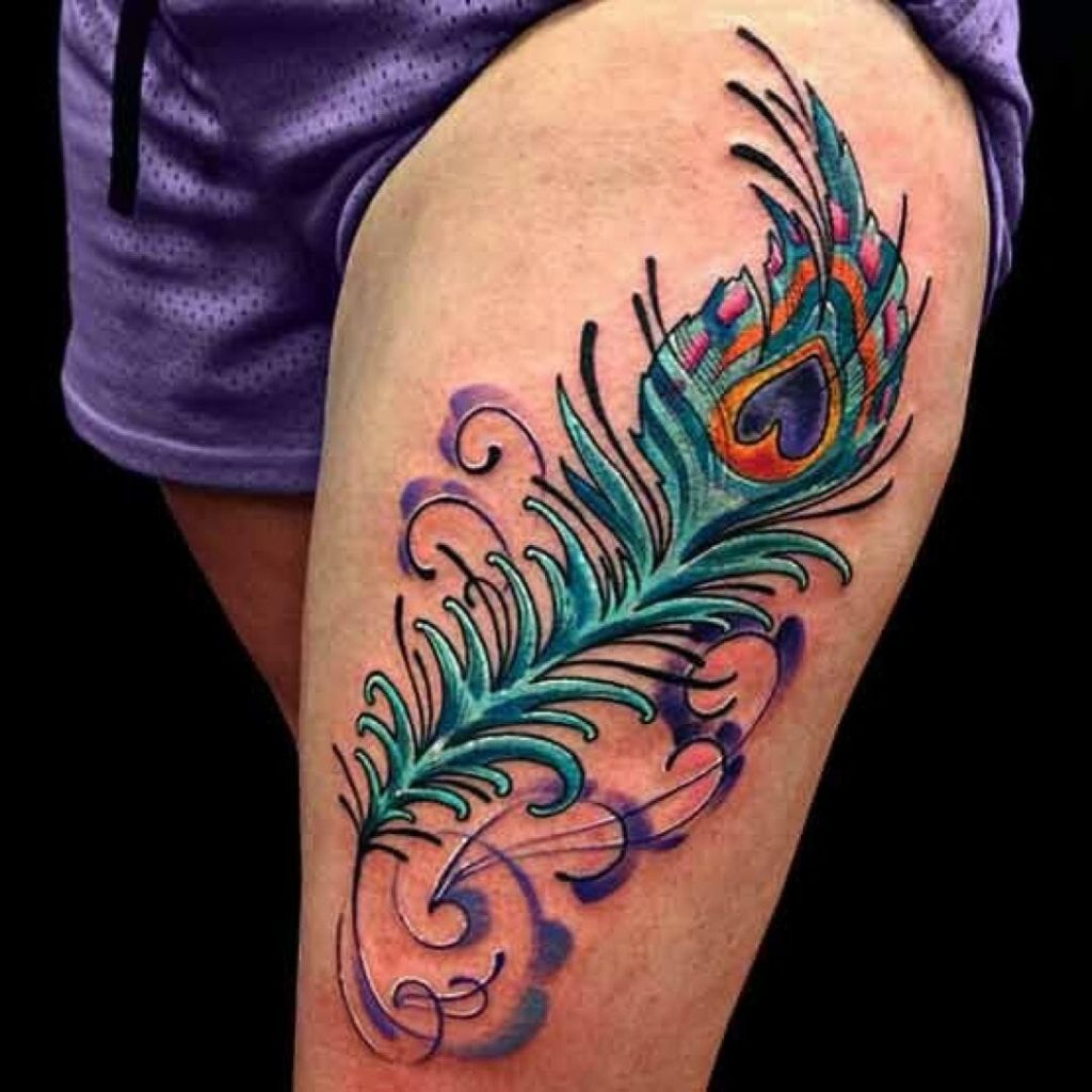 peacock thigh tattoo
