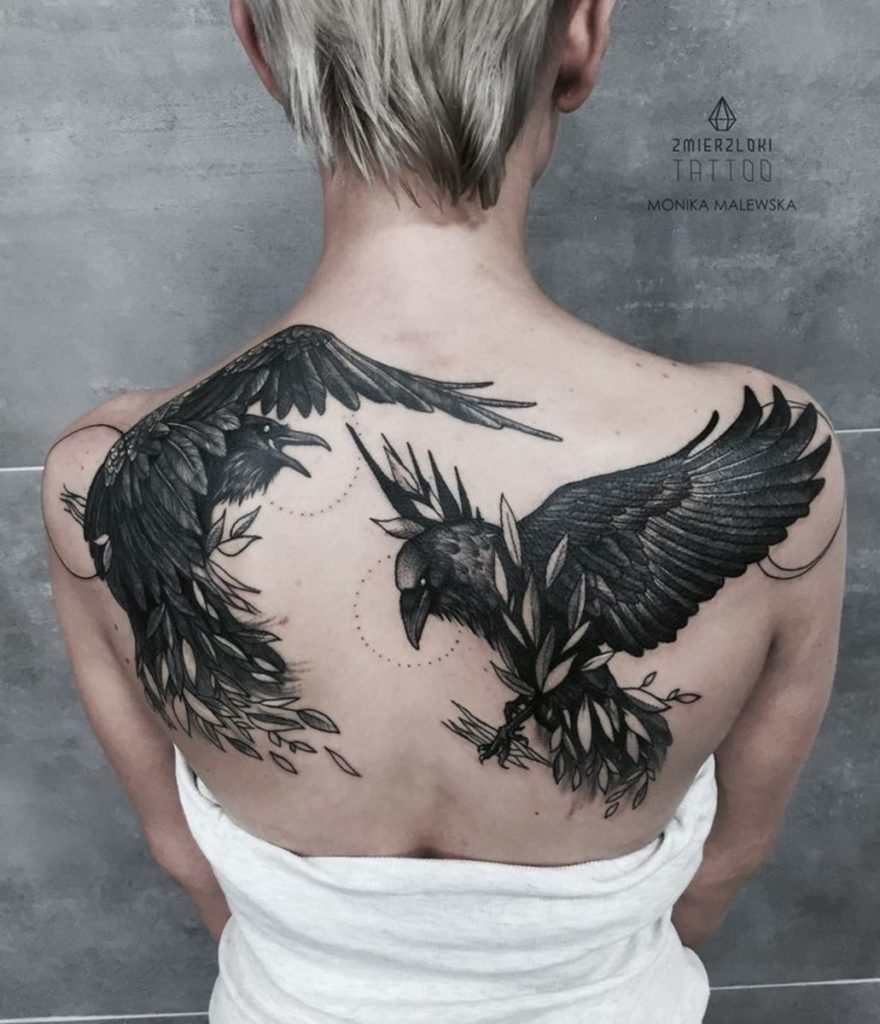raven chest tattoo