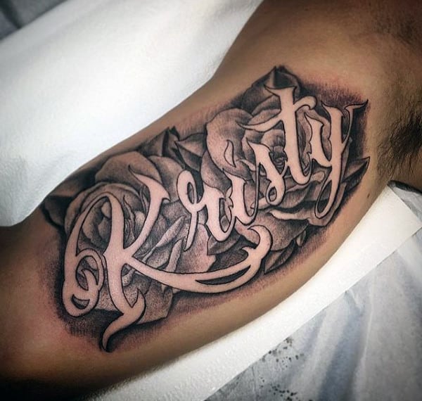 rose tattoo with name inside