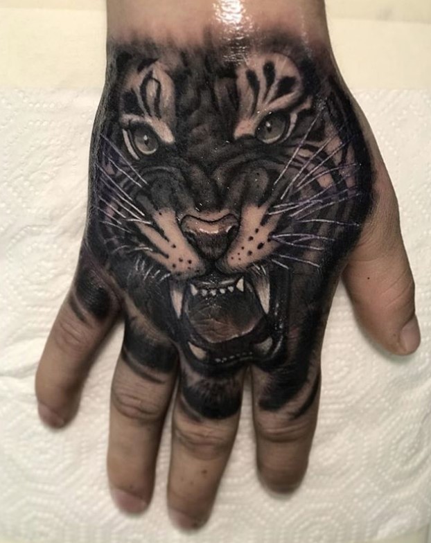 tiger hand tattoo