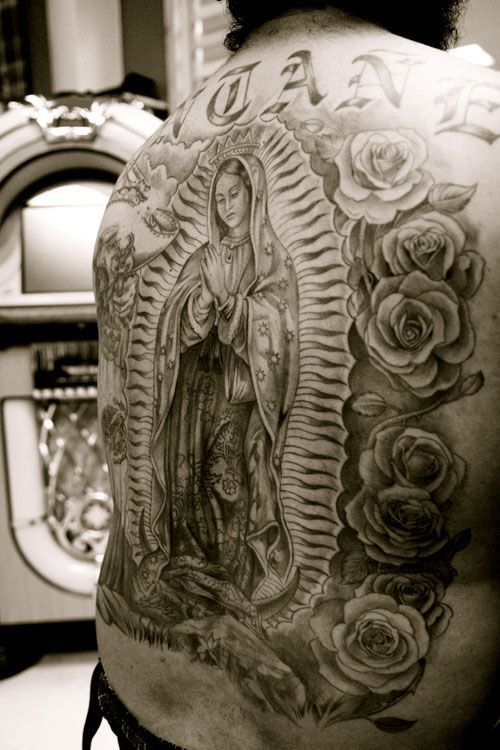 virgin mary back tattoo