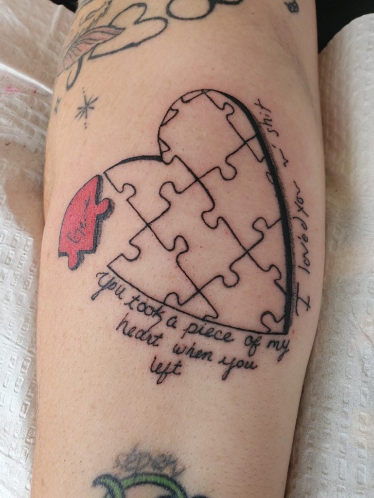 heart puzzle piece tattoo