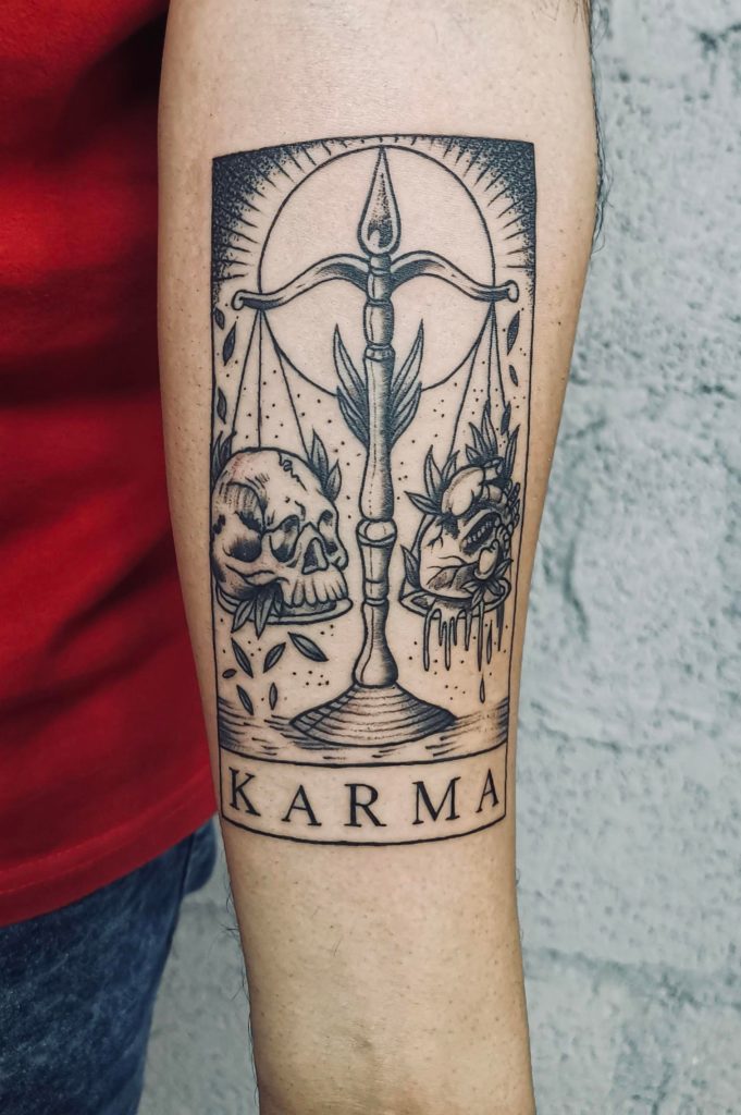 karma symbol tattoo