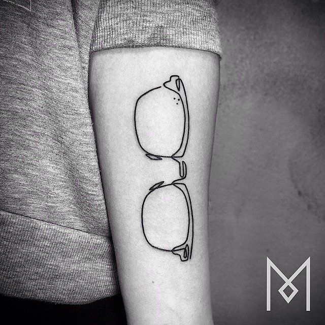 Glasses tattoo