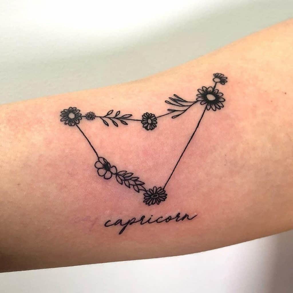 Capricorn flower tattoo