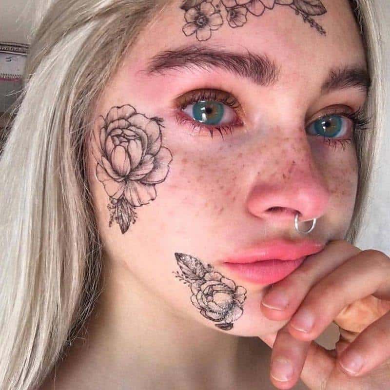 Flower face tattoo