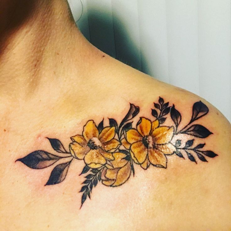 Buttercup flower tattoo