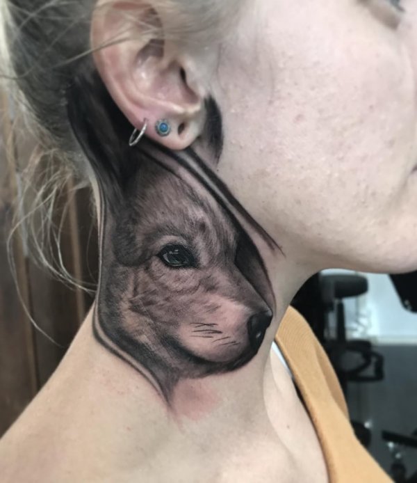 Wolf neck tattoo 