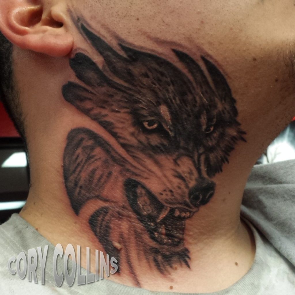 Wolf neck tattoo
